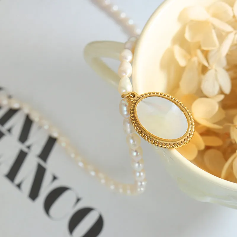 Elegant French Pearl Necklace with Sea Shell Pendant